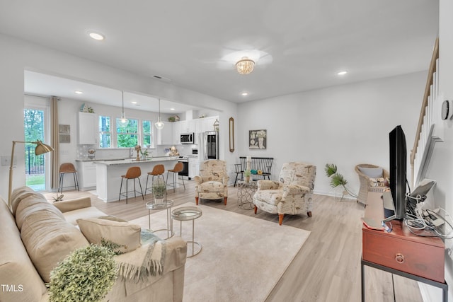 110 Gilder Woods Dr, Garner, NC 27529 - living area featuring light wood-type flooring and recessed lighting