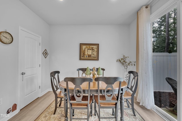 110 Gilder Woods Dr, Garner, NC 27529 - dining area with light wood-style flooring