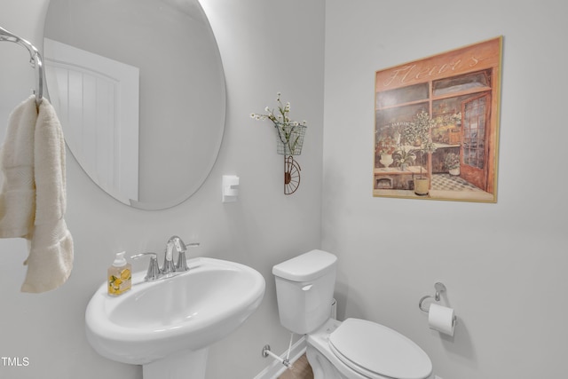 110 Gilder Woods Dr, Garner, NC 27529 - bathroom featuring toilet and a sink