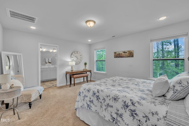 110 Gilder Woods Dr, Garner, NC 27529 - bedroom featuring light colored carpet, recessed lighting, and connected bathroom