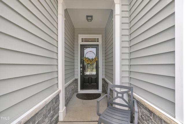 110 Gilder Woods Dr, Garner, NC 27529 - property entrance featuring stone siding