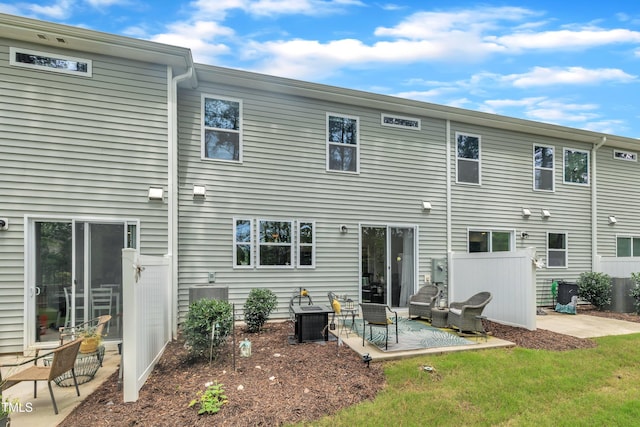 110 Gilder Woods Dr, Garner, NC 27529 - rear view of house with a patio