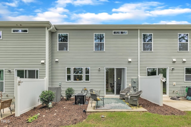110 Gilder Woods Dr, Garner, NC 27529 - rear view of house featuring a patio