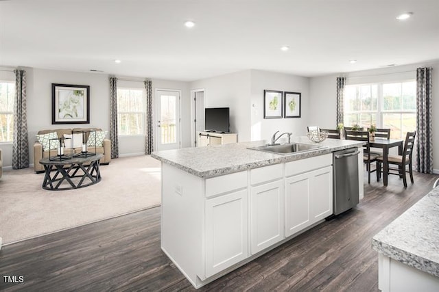 525 Camero Rift Trl, Wendell, NC 27591 - kitchen with open floor plan, stainless steel dishwasher, recessed lighting, an island with sink, and white cabinetry
