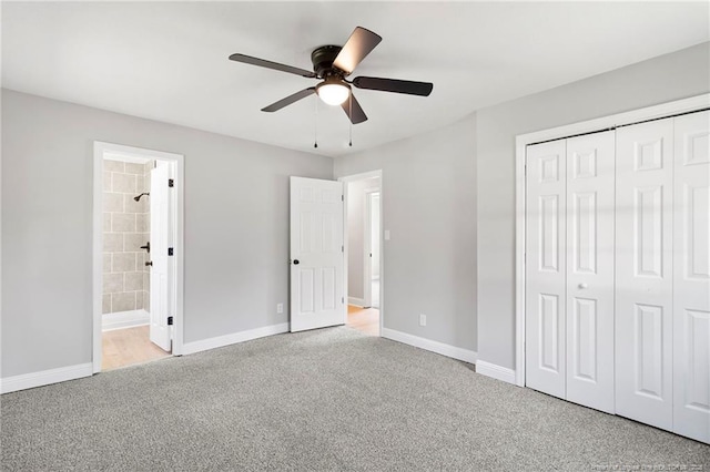 6123 Malvern Cir, Fayetteville, NC 28314 - unfurnished bedroom featuring light carpet, a closet, a ceiling fan, and ensuite bathroom