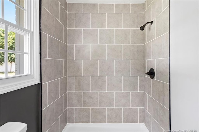6123 Malvern Cir, Fayetteville, NC 28314 - bathroom featuring a tile shower and toilet
