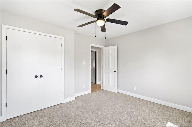 6123 Malvern Cir, Fayetteville, NC 28314 - unfurnished bedroom featuring light colored carpet, a closet, and ceiling fan