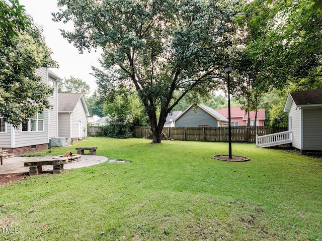 3525 Lytham Pl, Raleigh, NC 27604 - fenced backyard with a patio area and an outdoor fire pit
