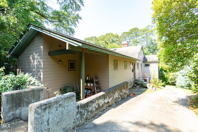 1228 Marshall St, Raleigh, NC 27604 - view of property exterior featuring a chimney