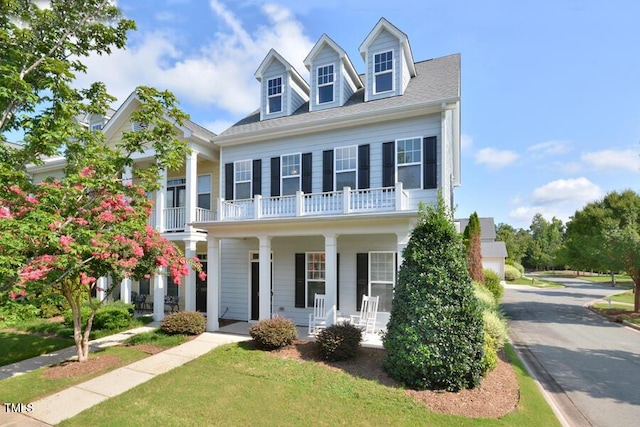 1079 Perdue Dr, Chapel Hill, NC 27517 - view of front of property featuring a porch, a balcony, and roof with shingles