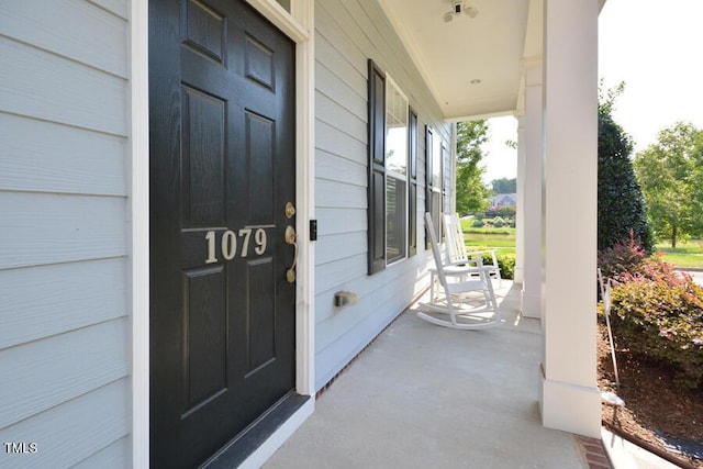 1079 Perdue Dr, Chapel Hill, NC 27517 - property entrance with a porch