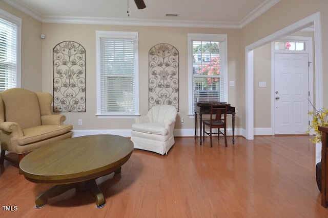 1079 Perdue Dr, Chapel Hill, NC 27517 - sitting room featuring wood finished floors, crown molding, and a ceiling fan