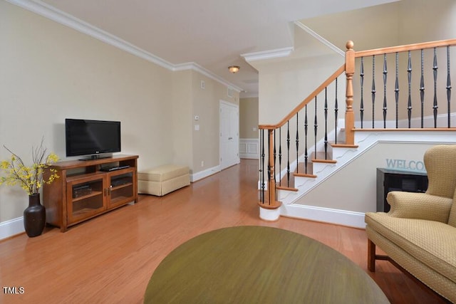 1079 Perdue Dr, Chapel Hill, NC 27517 - living room featuring wood finished floors, ornamental molding, and stairs