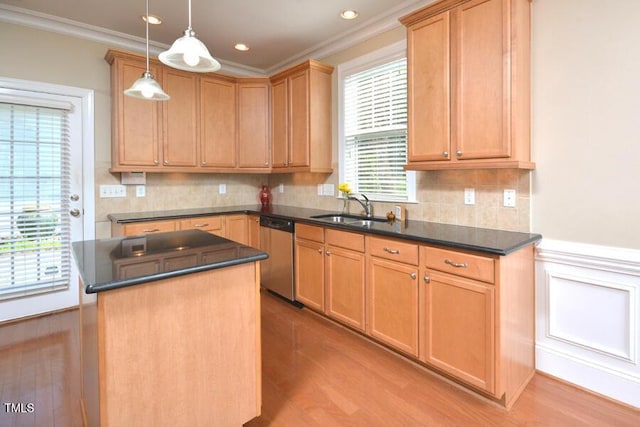 1079 Perdue Dr, Chapel Hill, NC 27517 - kitchen featuring dark countertops, ornamental molding, light wood finished floors, a center island, and dishwasher