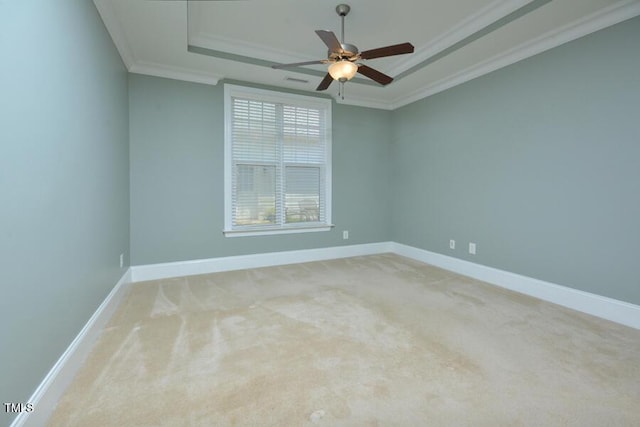 1079 Perdue Dr, Chapel Hill, NC 27517 - carpeted empty room with ornamental molding, a tray ceiling, and a ceiling fan