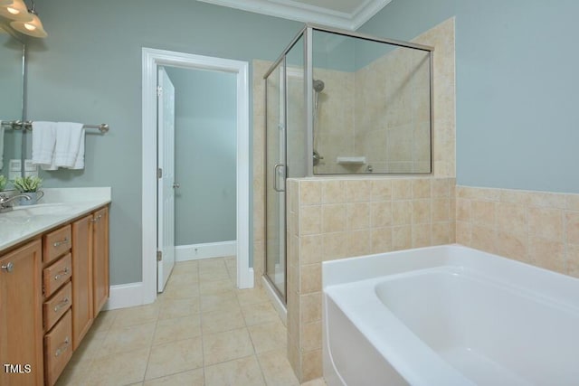 1079 Perdue Dr, Chapel Hill, NC 27517 - full bathroom featuring a bath, vanity, a shower stall, tile patterned floors, and crown molding