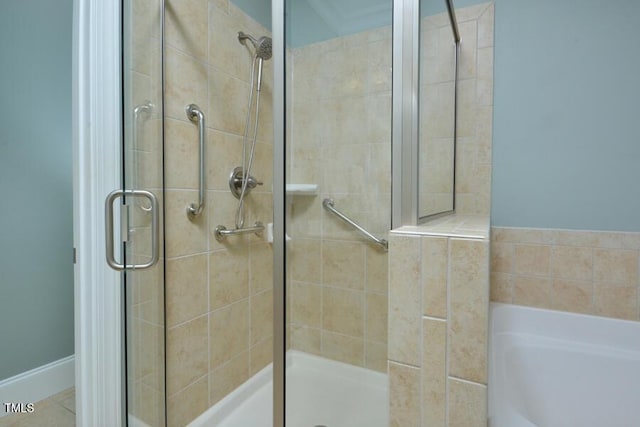 1079 Perdue Dr, Chapel Hill, NC 27517 - bathroom featuring a garden tub and a stall shower