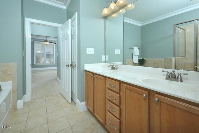 1079 Perdue Dr, Chapel Hill, NC 27517 - bathroom with ornamental molding, a garden tub, tile patterned flooring, and double vanity