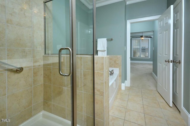 1079 Perdue Dr, Chapel Hill, NC 27517 - bathroom featuring crown molding, a garden tub, a stall shower, tile patterned flooring, and a ceiling fan