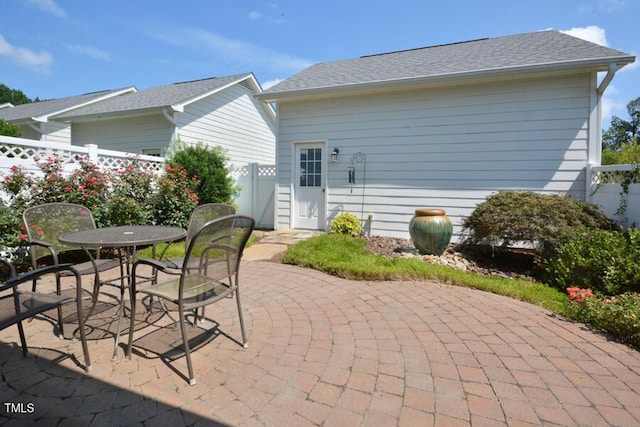1079 Perdue Dr, Chapel Hill, NC 27517 - fenced backyard featuring a patio and outdoor dining space