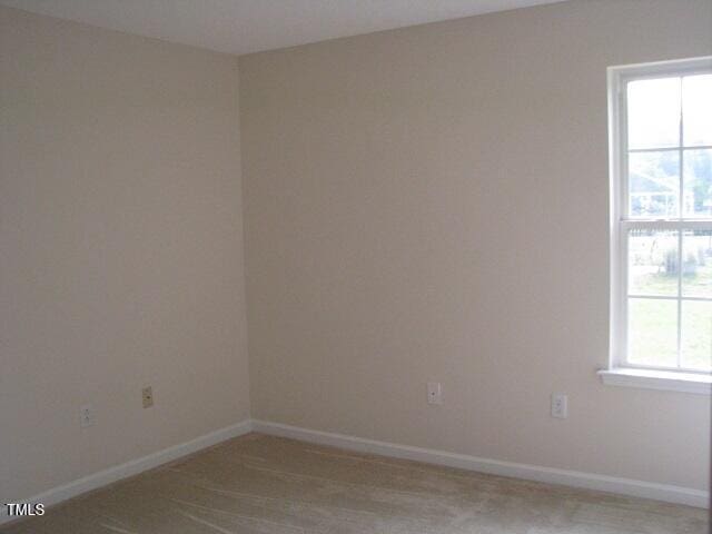 4419 Nightfall Ct, Durham, NC 27713 - spare room with baseboards
