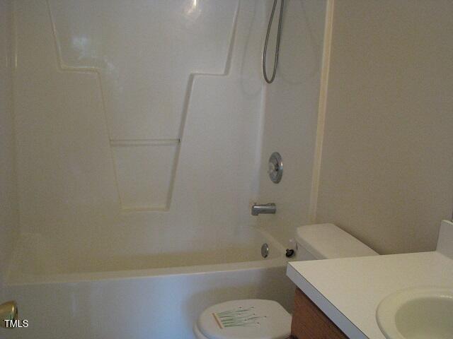 4419 Nightfall Ct, Durham, NC 27713 - bathroom featuring vanity and shower / bath combination