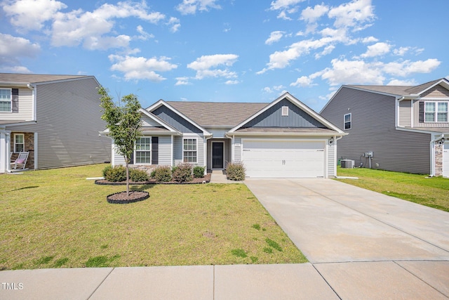 757 Frosty Way, Zebulon, NC 27597 - view of front facade featuring board and batten siding, driveway, an attached garage, and a front yard