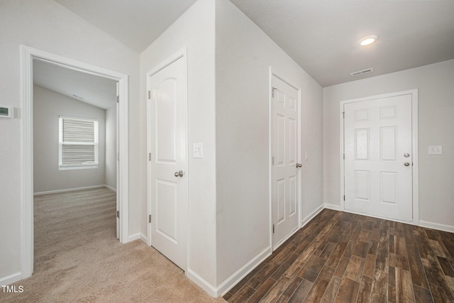 757 Frosty Way, Zebulon, NC 27597 - corridor featuring vaulted ceiling and wood finished floors