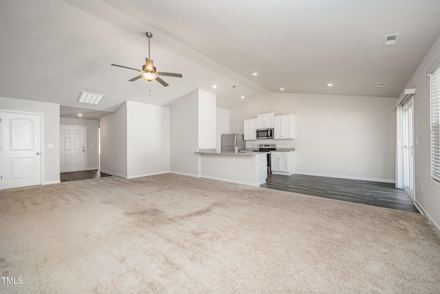757 Frosty Way, Zebulon, NC 27597 - unfurnished living room with dark carpet, ceiling fan, recessed lighting, and high vaulted ceiling