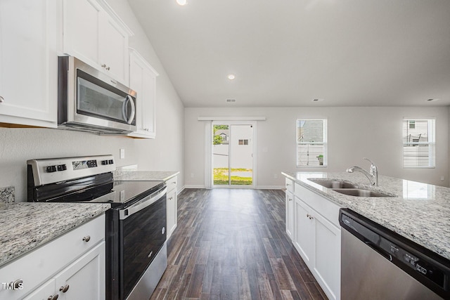 757 Frosty Way, Zebulon, NC 27597 - kitchen featuring stainless steel appliances, dark wood finished floors, light stone counters, white cabinets, and recessed lighting