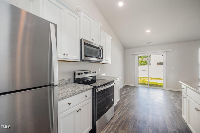 757 Frosty Way, Zebulon, NC 27597 - kitchen with appliances with stainless steel finishes, dark wood finished floors, recessed lighting, white cabinetry, and light stone countertops