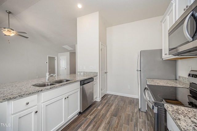 757 Frosty Way, Zebulon, NC 27597 - kitchen featuring stainless steel appliances, a ceiling fan, dark wood-style flooring, light stone countertops, and white cabinets