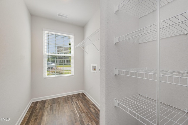 757 Frosty Way, Zebulon, NC 27597 - laundry area with wood finished floors and hookup for a washing machine