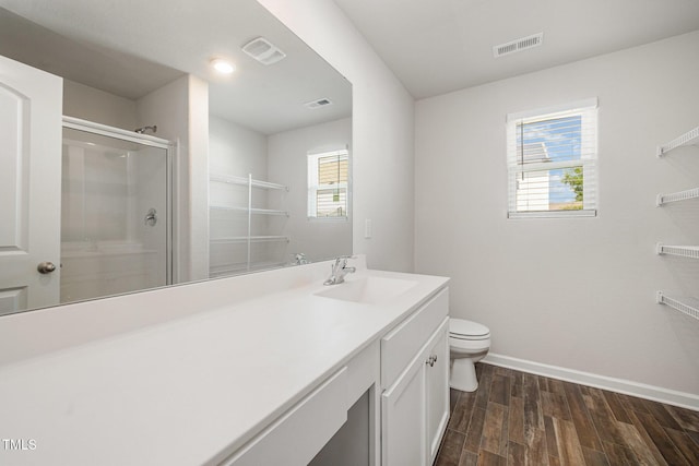 757 Frosty Way, Zebulon, NC 27597 - bathroom with vanity, wood finished floors, and a stall shower