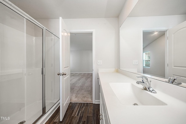 757 Frosty Way, Zebulon, NC 27597 - bathroom featuring a stall shower, vanity, and wood finished floors