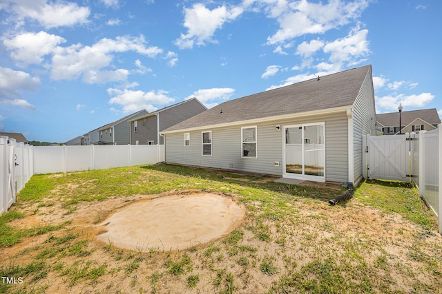 757 Frosty Way, Zebulon, NC 27597 - rear view of house featuring a fenced backyard and a gate