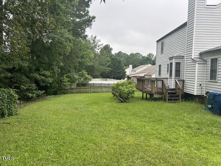 8 Colton Ct, Durham, NC 27713 - view of yard with a wooden deck