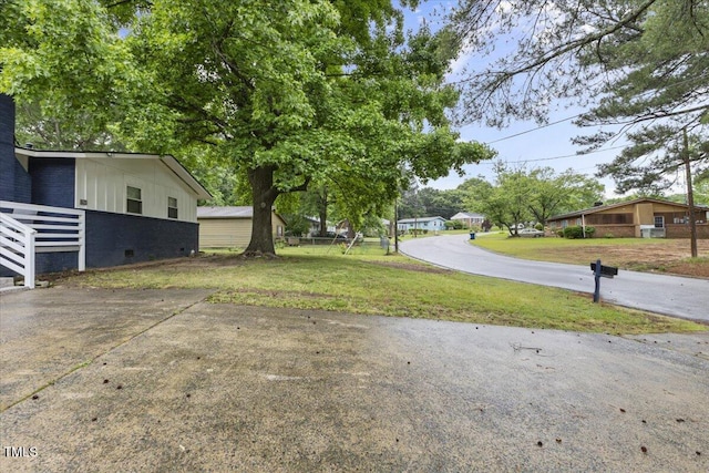 2752 Weldon Ter, Durham, NC 27703 - view of grassy yard with driveway