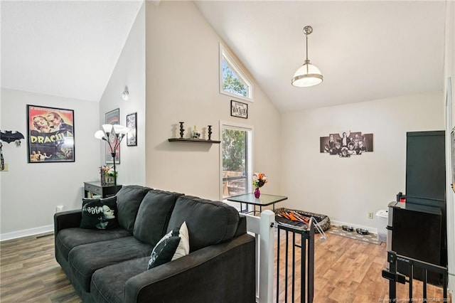 5905 Waters Edge Dr, Fayetteville, NC 28314 - living room with high vaulted ceiling and wood finished floors