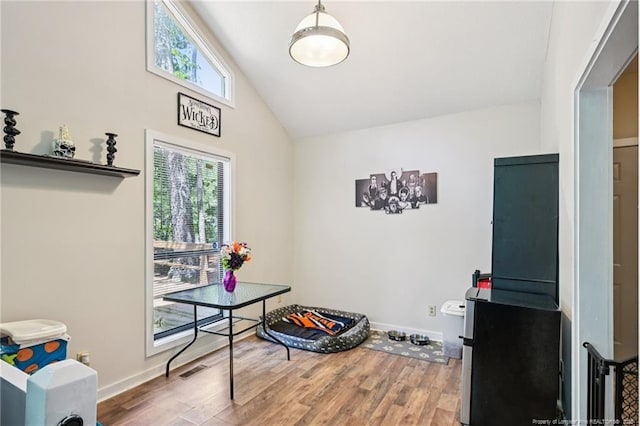 5905 Waters Edge Dr, Fayetteville, NC 28314 - playroom with lofted ceiling and wood finished floors