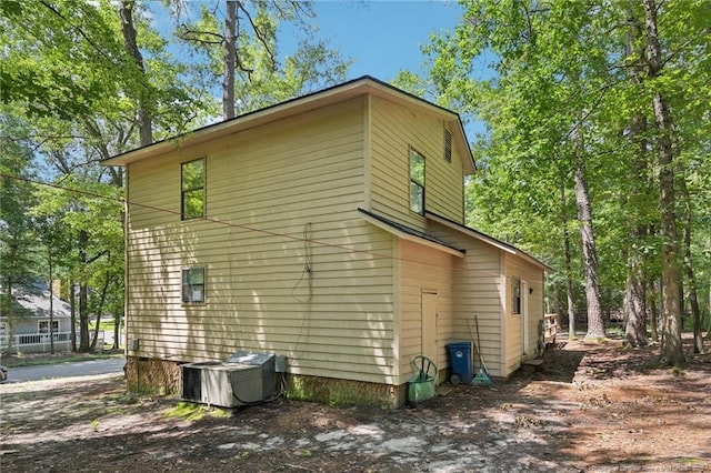 5905 Waters Edge Dr, Fayetteville, NC 28314 - view of side of property with a central air condition unit