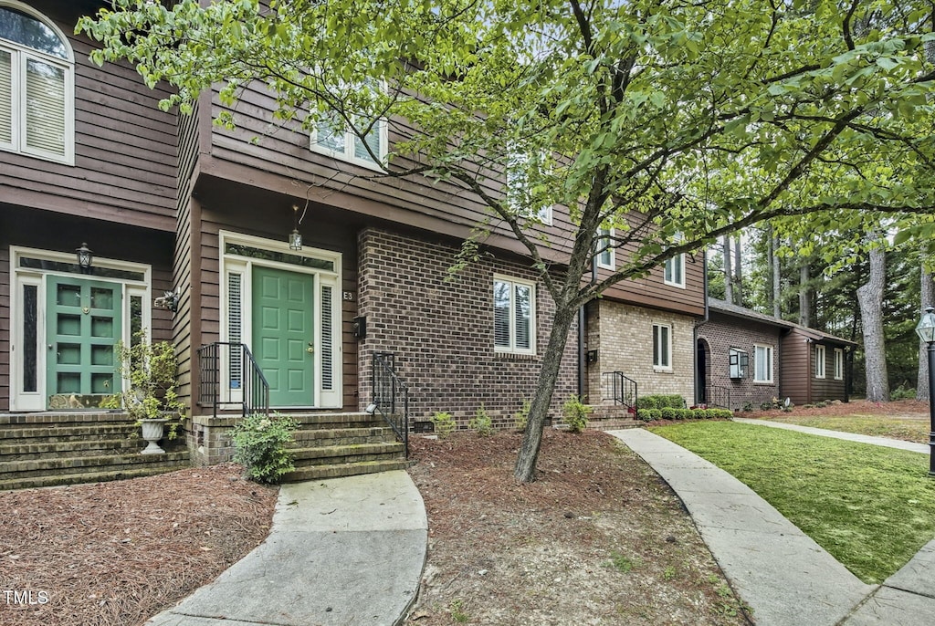 1311 Forest Hills Rd NW Unit E3, Wilson, NC 27896 - entrance to property featuring brick siding