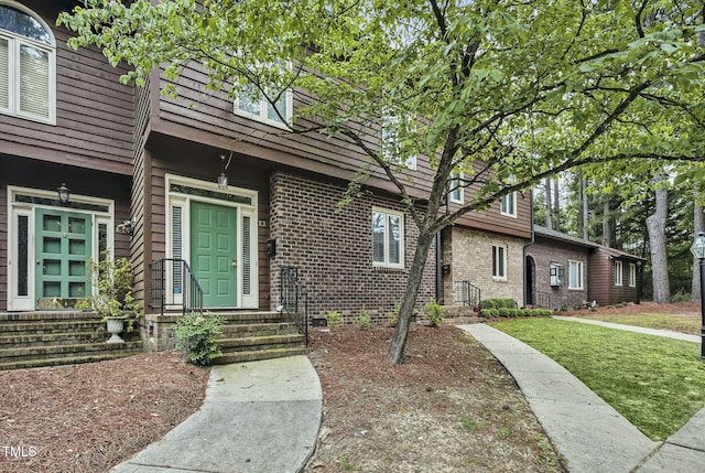 1311 Forest Hills Rd NW Unit E3, Wilson, NC 27896 - entrance to property featuring brick siding