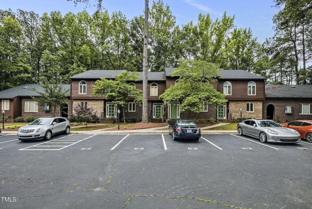1311 Forest Hills Rd NW Unit E3, Wilson, NC 27896 - view of property with uncovered parking