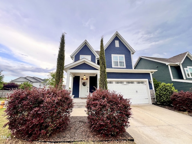 1925 Bright Kannon Way, Wendell, NC 27591 - view of front of property with a garage, concrete driveway, and stone siding