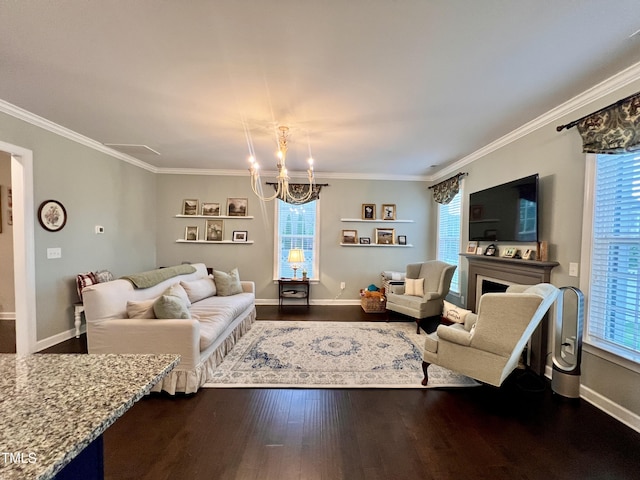 1925 Bright Kannon Way, Wendell, NC 27591 - living room with dark wood-type flooring, crown molding, healthy amount of natural light, and a chandelier