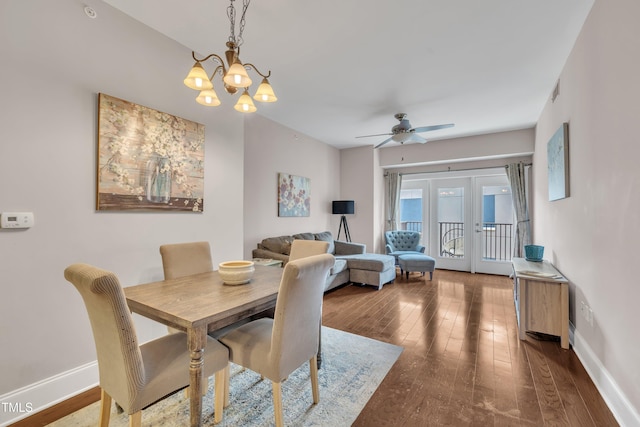 222 Glenwood Ave # 416, Raleigh, NC 27603 - dining area featuring hardwood / wood-style flooring, a chandelier, ceiling fan, and french doors