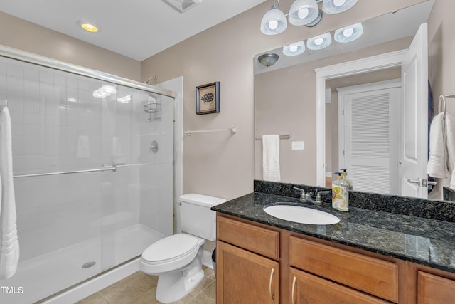 222 Glenwood Ave # 416, Raleigh, NC 27603 - full bath with a stall shower, vanity, and tile patterned flooring