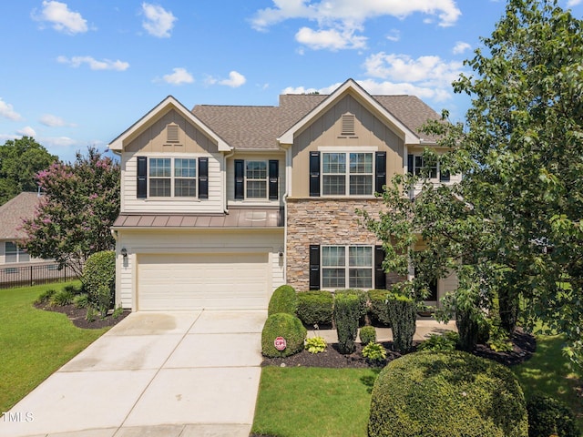 2505 Goldeneye Ct, Raleigh, NC 27606 - view of front of property with driveway, a garage, board and batten siding, and roof with shingles