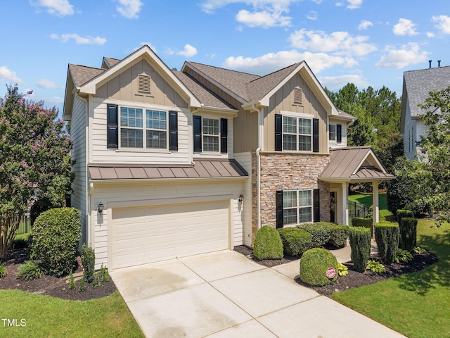 2505 Goldeneye Ct, Raleigh, NC 27606 - craftsman house with board and batten siding, concrete driveway, an attached garage, stone siding, and roof with shingles